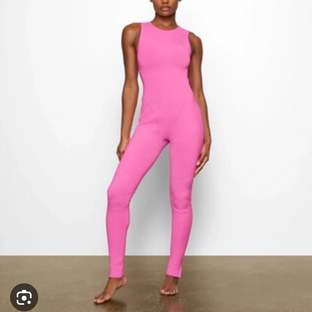 Sw10. skims sport swim full length wetsuit rash guard in taffy pink nwt XXS / xl